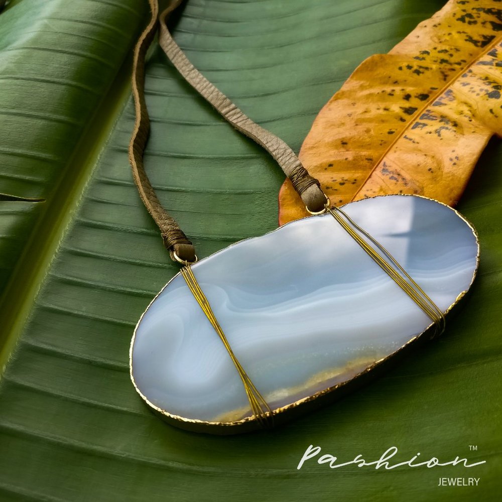 Statement long necklace with big stone.